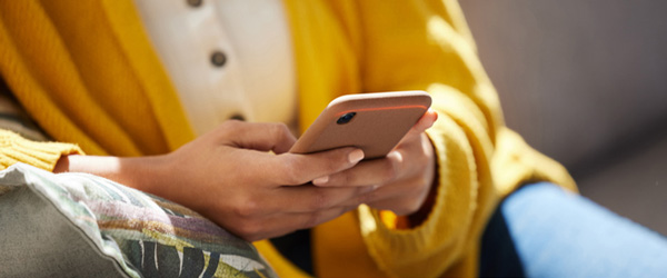 woman hands holding mobile phone